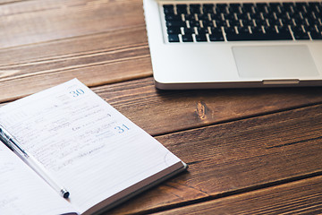 Image showing Laptop and diary on the desk