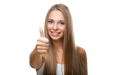 Image showing Portrait of beautiful woman show thumb up