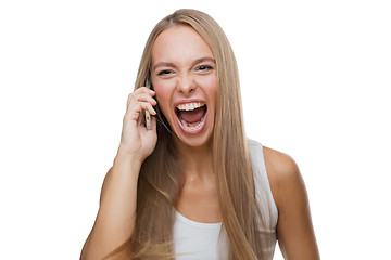 Image showing Laughing woman talking on phone