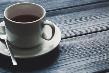 Image showing Cup of tea on Wooden Table