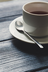 Image showing Cup of tea on Wooden Table