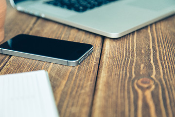 Image showing Laptop and diary on the desk