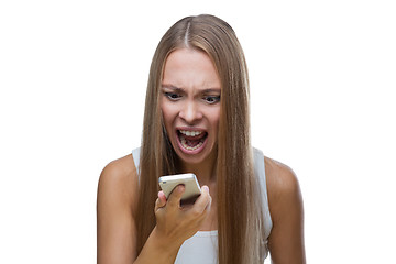 Image showing Angry woman talking on phone