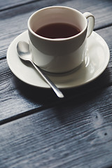 Image showing Cup of tea on Wooden Table