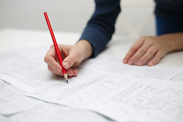 Image showing Architect sketching a construction project