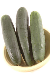 Image showing three cucumbers