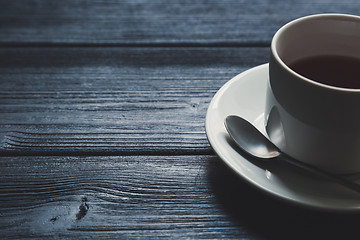 Image showing Cup of tea on Wooden Table