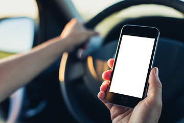 Image showing Woman using phone in the car