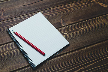 Image showing notebook with pen and coffee  on old  wooden table