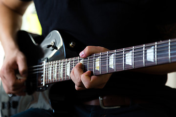 Image showing Man playing on guitar