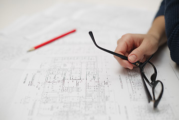 Image showing Architect sketching a construction project