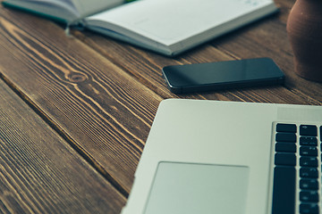 Image showing Laptop and diary on the desk