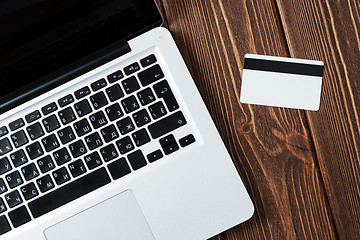 Image showing Laptop and credit card on the desk