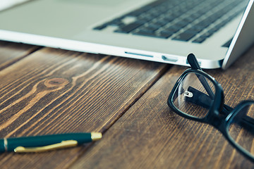 Image showing Laptop and diary on the desk