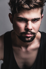 Image showing Portrait of young man in black t-shirt