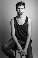 Image showing Black and white portrait of a young man in a black t-shirt