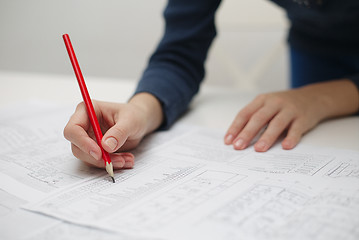 Image showing Architect sketching a construction project