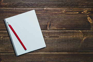 Image showing notebook with pen and coffee  on old  wooden table