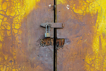 Image showing Background of door with lock in metal material 