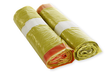 Image showing Rolls of yellow trash bags 