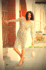 Image showing smiling middle-aged woman in a summer dress