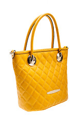 Image showing Yellow womens bag isolated on white background.