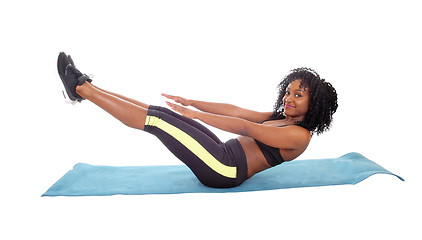 Image showing Pretty African American girl exercising.