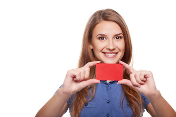 Image showing Confident business woman in glasses showing blank credit card