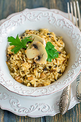 Image showing Risotto with mushrooms and onions. View from above.
