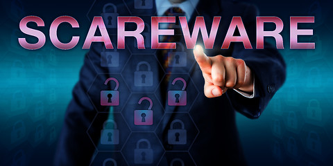 Image showing Management User Touching SCAREWARE Onscreen