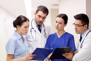 Image showing group of medics at hospital with clipboard