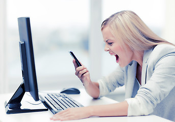 Image showing angry woman with phone