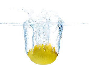 Image showing lemon falling or dipping in water with splash