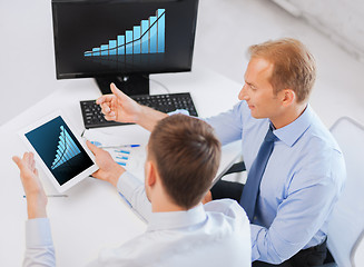 Image showing businessmen with tablet pc and computer at office