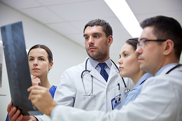 Image showing group of doctors looking at x-ray scan image