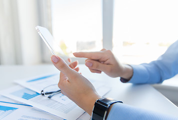 Image showing close up of woman with transparent smartphone