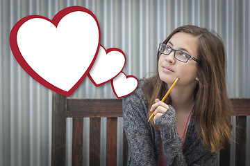 Image showing Daydreaming Girl With Blank Floating Hearts - Clipping Path