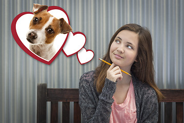 Image showing Daydreaming Girl Next To Floating Hearts with Puppy Within