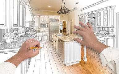 Image showing Male Hands Sketching Custom Kitchen with Photo Showing Through