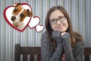 Image showing Daydreaming Girl Next To Floating Hearts with Puppy Within