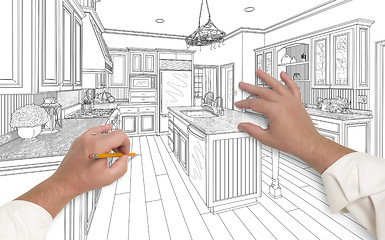 Image showing Male Hands Sketching Beautiful Custom Kitchen