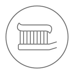 Image showing Toothbrush with toothpaste line icon.