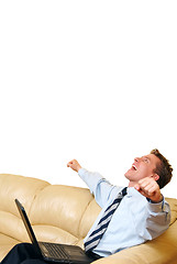 Image showing Young businessman with laptop enjoying a success