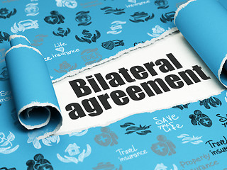 Image showing Insurance concept: black text Bilateral Agreement under the piece of  torn paper