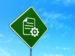 Image showing Programming concept: Gear on road sign background