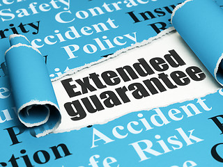 Image showing Insurance concept: black text Extended Guarantee under the piece of  torn paper