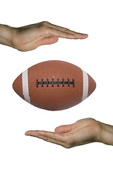 Image showing Holding the Football