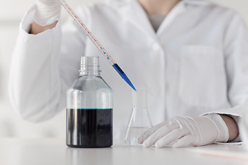 Image showing close up of scientist making test in lab