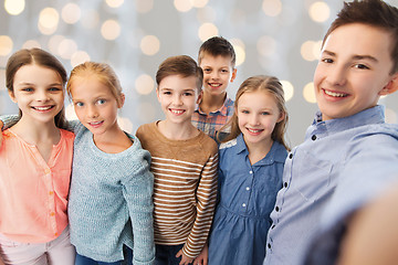 Image showing happy children talking selfie