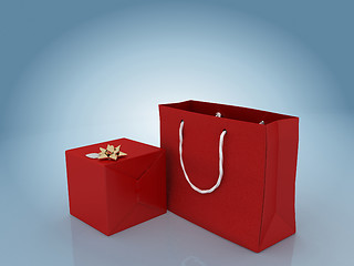 Image showing Gift box with golden bow and gift bag